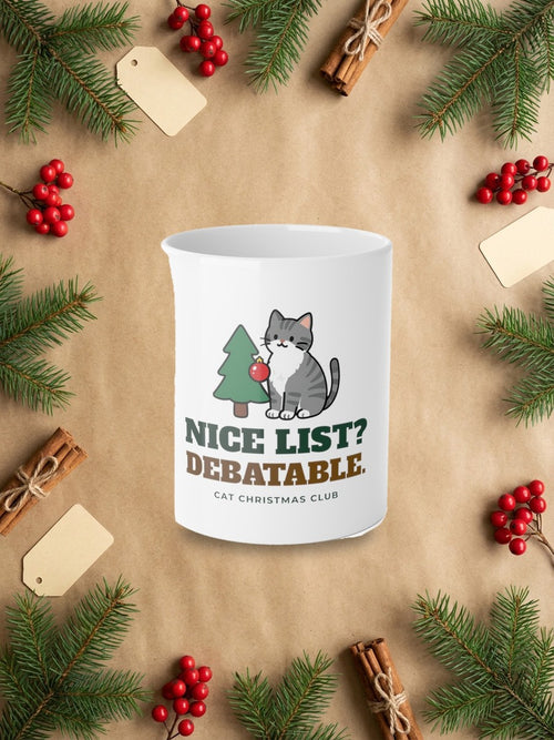 Nice List? Debatable Cat Christmas Mug in a styled table product photo