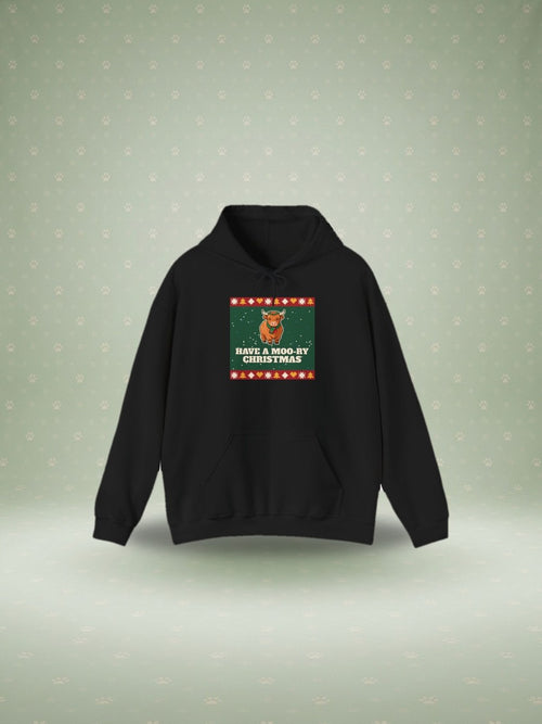 Moo-ry Christmas cow ugly sweater hoodie in a festive studio scene