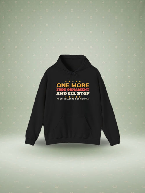 One More Frog Ornament Christmas hoodie in a festive studio scene
