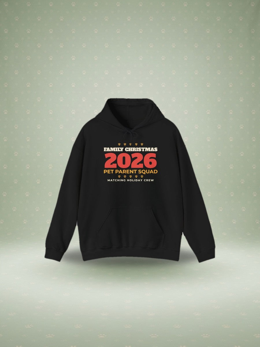Family Christmas 2026 pet parent squad hoodie in a festive studio scene