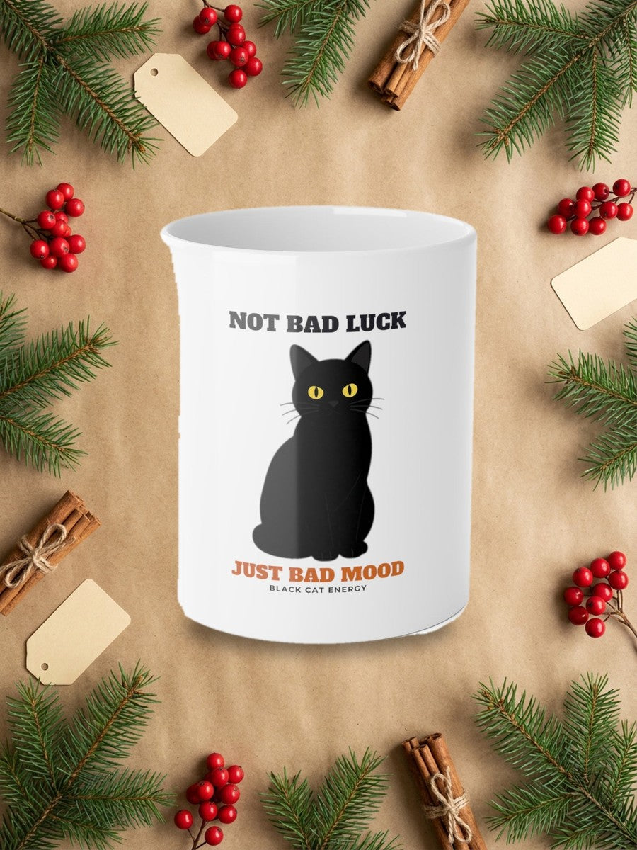 Not Bad Luck, Just a Bad Mood Black Cat Mug styled Christmas flat lay