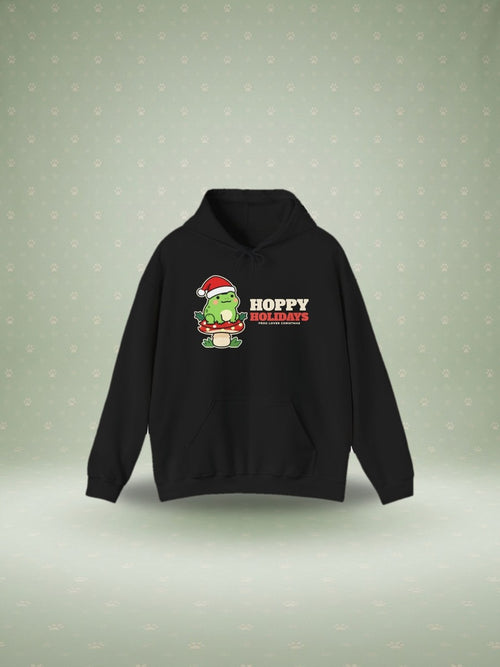 Hoppy Holidays frog Christmas hoodie in a festive studio scene