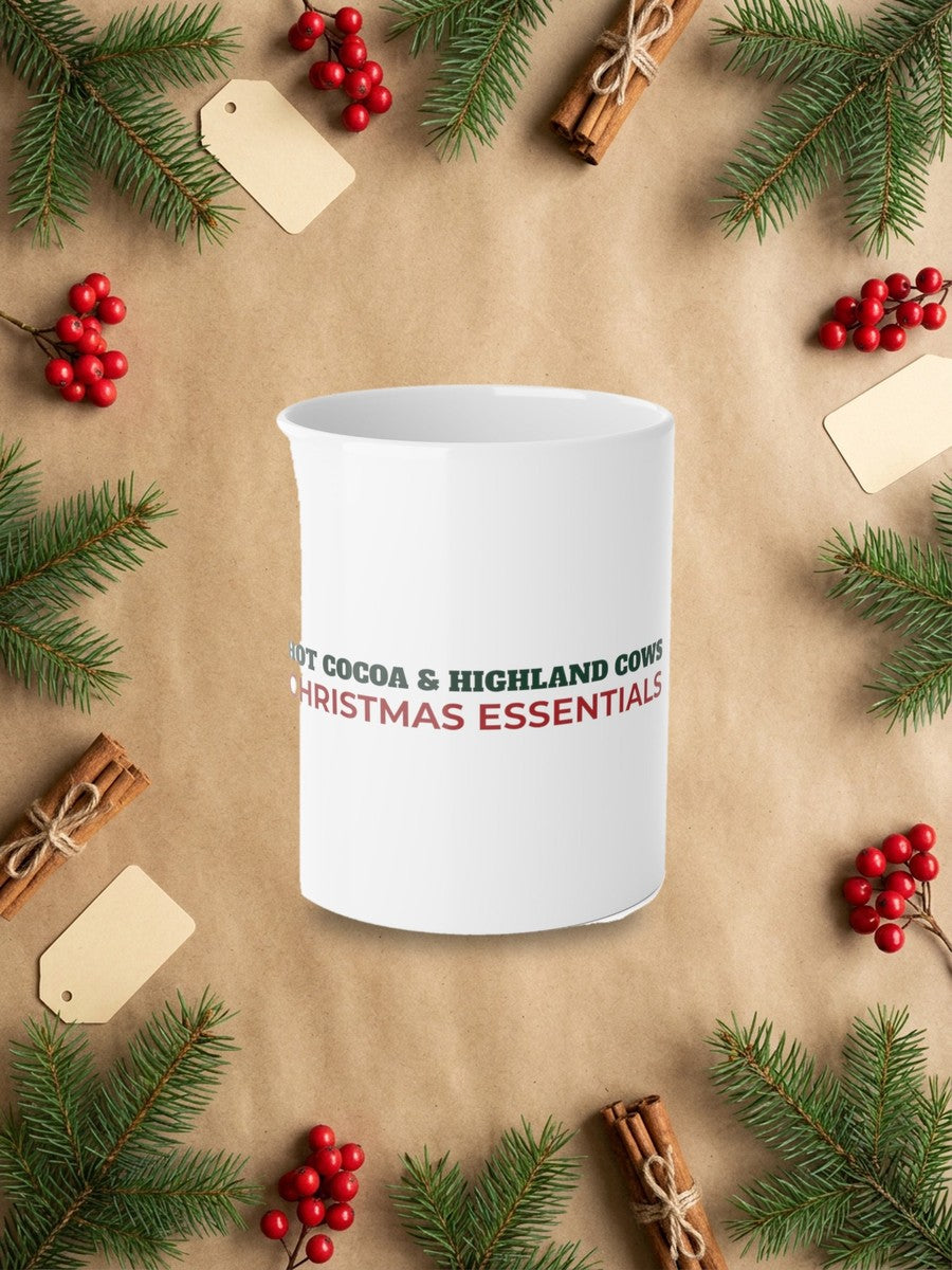 Hot Cocoa and Highland Cows Christmas Mug in a styled table product photo