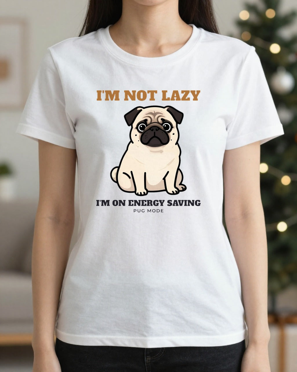 Woman wearing the I'm Not Lazy pug t-shirt by a Christmas tree